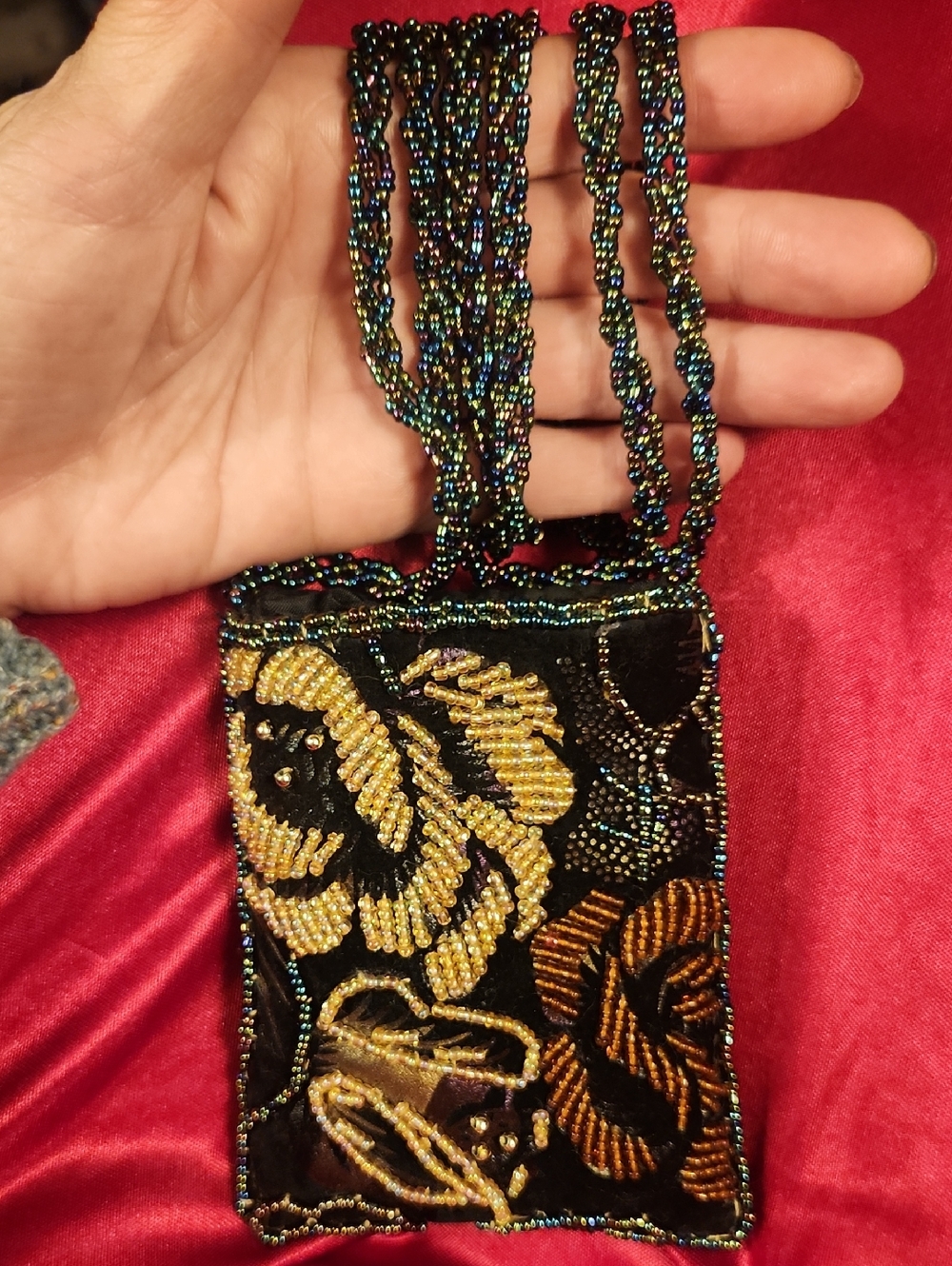 Beaded micro cross body bag with seed bead strap